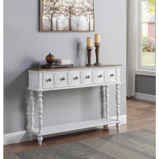 View of an antique white living room and hallway narrow table with drawers