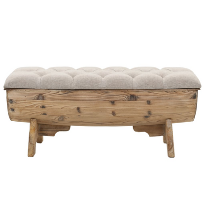 Front view of a storage bench made from solid wood with a comfy tufted seat in a beige color great for hallway or entryway showing lovely wood knots