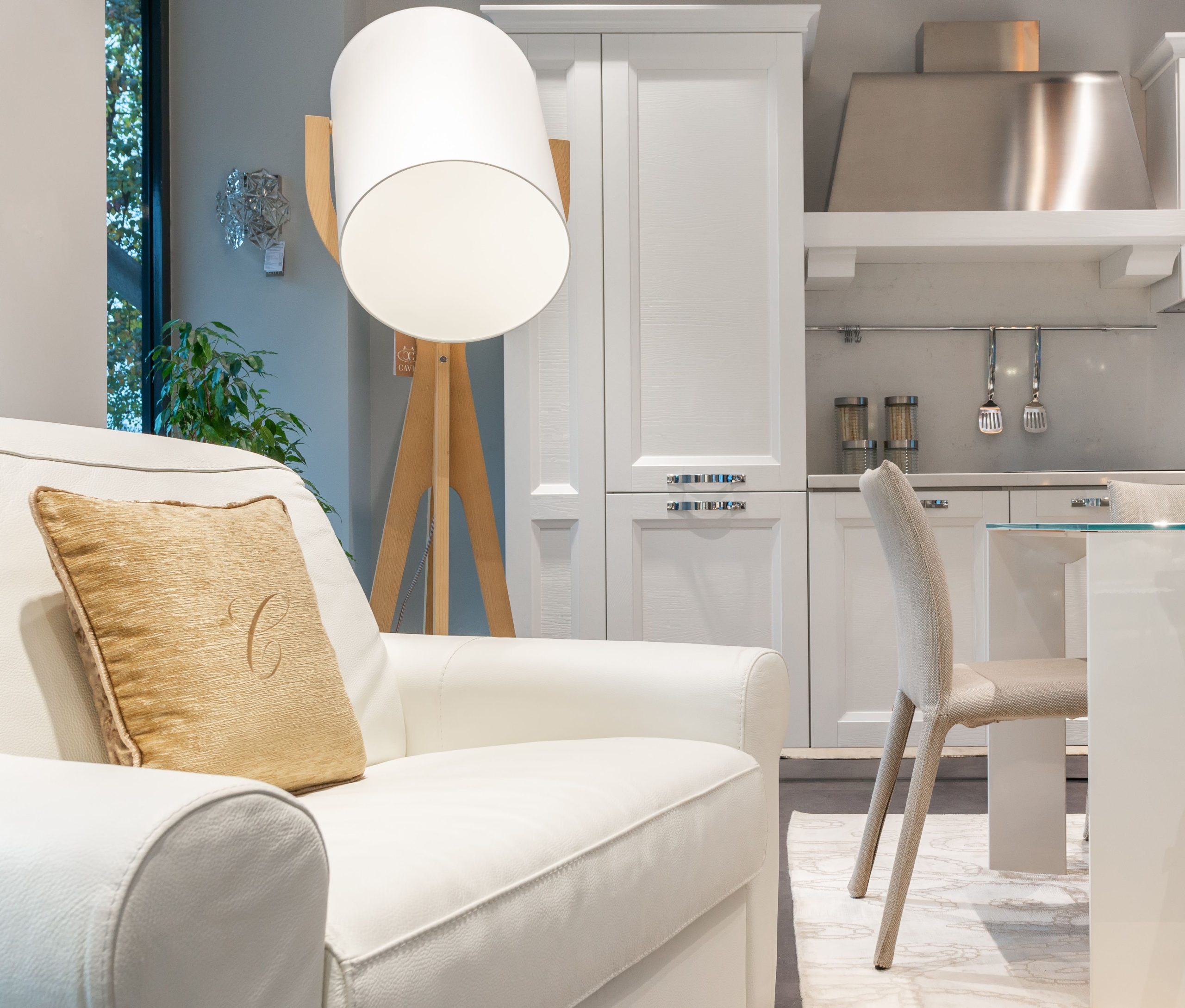 Decorative floor lamp in a white monochromatic studio space