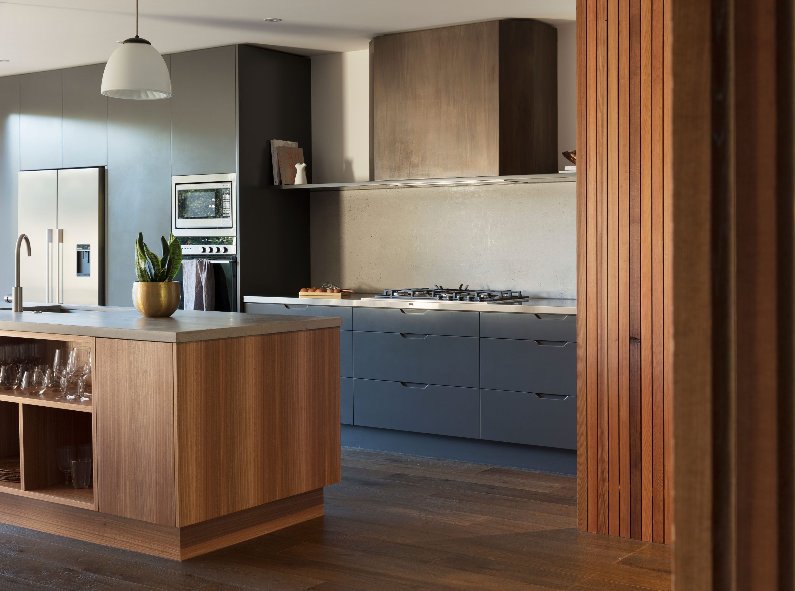 Modern clean kitchen with tones of espresso and smoky navy